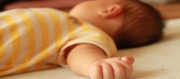 Bebelus ucis de propria mama Bebelus ucis de propria mama