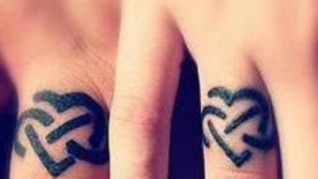 rings tattoo, wedding rings tattoo