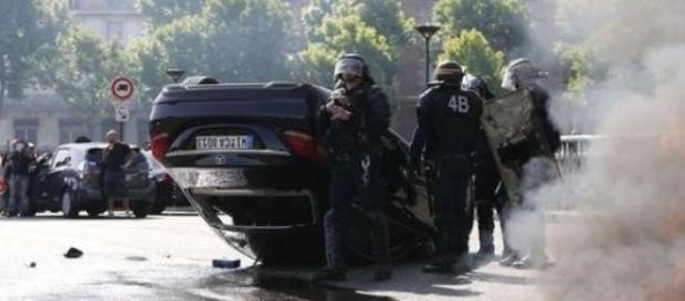 Riot police in the French capital. Image by BBC Riot police in the French capital. Image by BBC