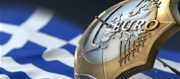 Grecia bajo el paraguas del Euro Grecia bajo el paraguas del Euro