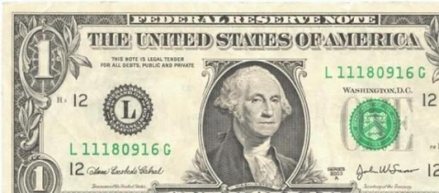 Billete de un dolar, cotizado en 16 pesos. Billete de un dolar, cotizado en 16 pesos.