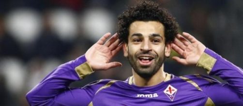 Salah esulta dopo un gol.