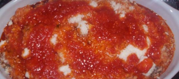 Il riso al forno con pomodoro e mozzarella Il riso al forno con pomodoro e mozzarella