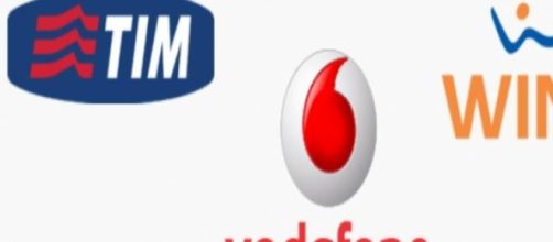 I loghi di Tim, Vodafone e Wind