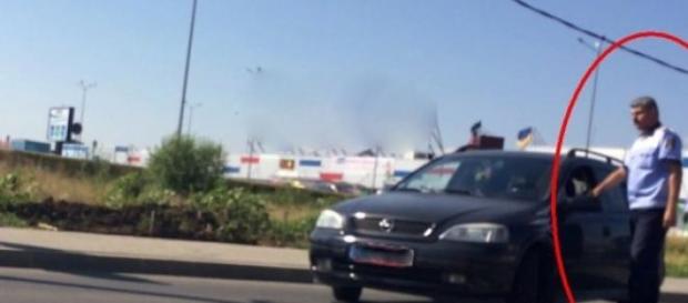 Poliţist ameninţă cu bătaia un şofer în trafic Poliţist ameninţă cu bătaia un şofer în trafic
