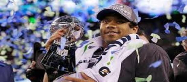 Russell Wilson is now the 2nd highest paid QB Russell Wilson is now the 2nd highest paid QB