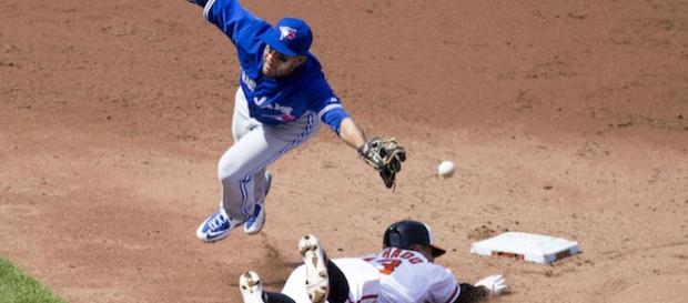 Blue Jays' Devon Travis goes for it. Blue Jays' Devon Travis goes for it.
