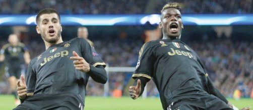 Morata e Pogba dopo il 2-1 contro il City