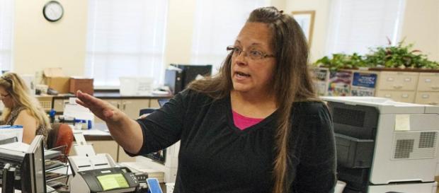 Kim Davis refusing to issue a marriage license. Kim Davis refusing to issue a marriage license.