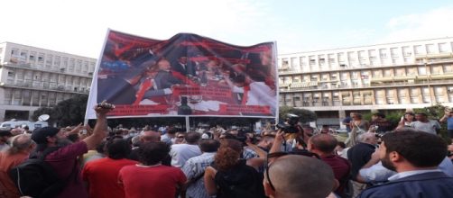 Lo striscione portato dai manifestanti a Don Bosco