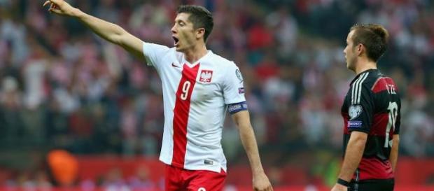 Robert Lewandowski celebrating his goal. Robert Lewandowski celebrating his goal.