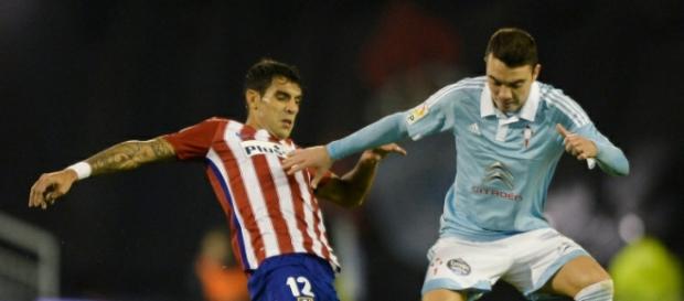 Augusto y Aspas en la disputa por un balón Augusto y Aspas en la disputa por un balón