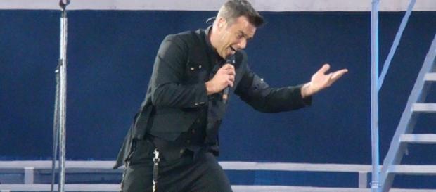 Robbie Williams loves being on stage Robbie Williams loves being on stage