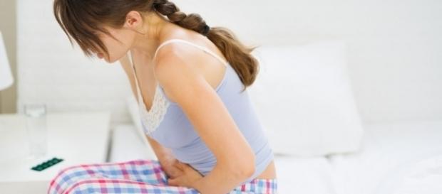 Muitas mulheres sofrem muito com as cólicas menstruais Muitas mulheres sofrem muito com as cólicas menstruais
