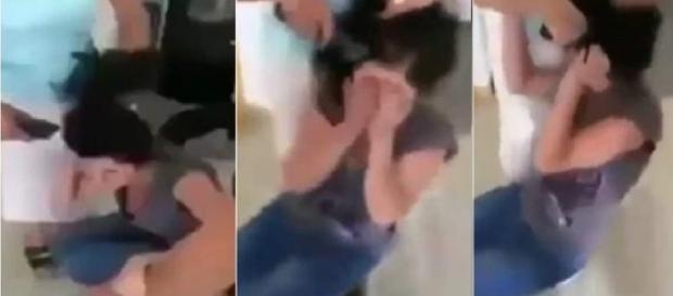 Mulher bate em menina após ela rir de criança Mulher bate em menina após ela rir de criança