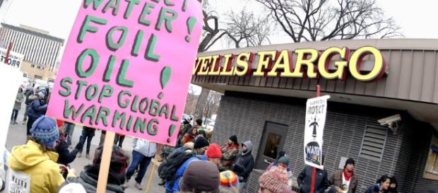 Protesters at Wells Fargo in Bismark, North Dakota / Photo by Mike Mccleary/The Bismarck Tribune, via Blasting News Library Protesters at Wells Fargo in Bismark, North Dakota / Photo by Mike Mccleary/The Bismarck Tribune, via Blasting News Library