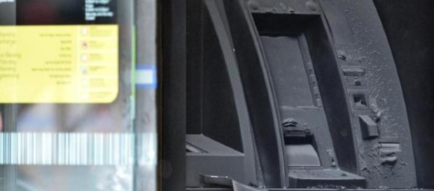 An ATM machine is burned at a branch of the Commonwealth bank An ATM machine is burned at a branch of the Commonwealth bank