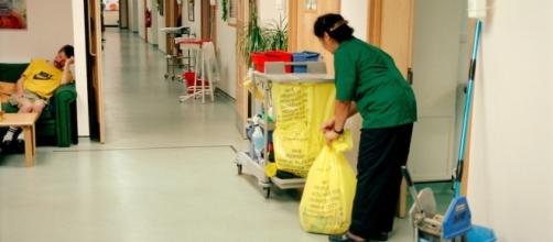 Hospital cleaner on AIDS ward at Ealing General Hospital, London ... - photoshelter.com