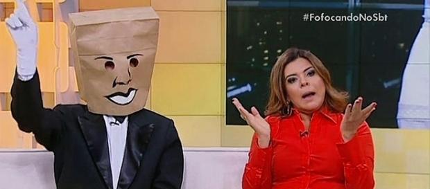 Mara Maravilha e Homem do Saco, apresentadores do Fofocando - Reprodução/Internet. Mara Maravilha e Homem do Saco, apresentadores do Fofocando - Reprodução/Internet.