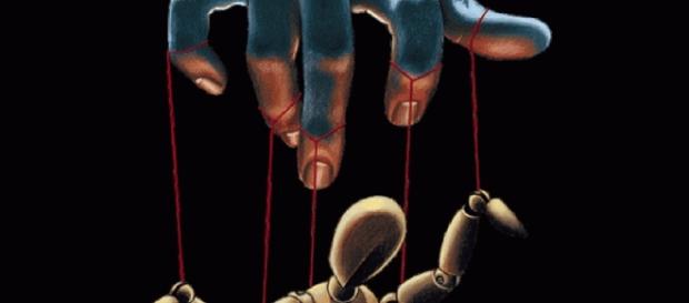 Como marionetes, somos controlados pelas elites através da mídia Como marionetes, somos controlados pelas elites através da mídia