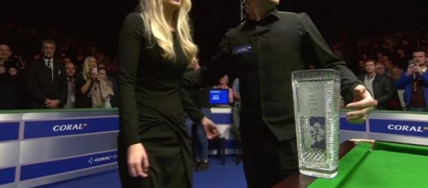 Mark King picks up the Alex Higgins trophy in Belfast Mark King picks up the Alex Higgins trophy in Belfast