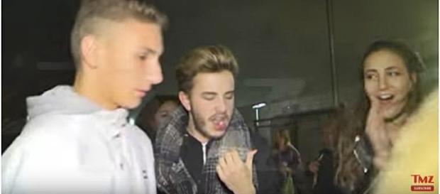 Justin Bieber punches fan in the face in Barcelona Spain / Screencap via TMZ Youtube Justin Bieber punches fan in the face in Barcelona Spain / Screencap via TMZ Youtube