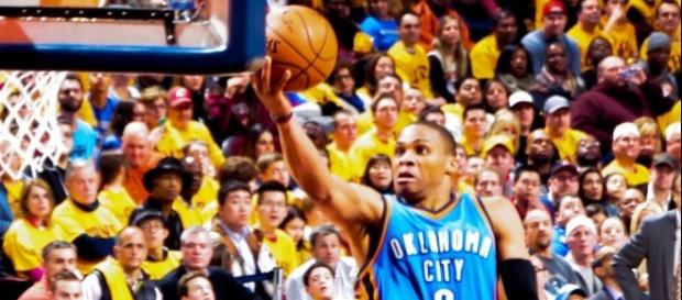 Russel Westbrook going strong to the basket Russel Westbrook going strong to the basket
