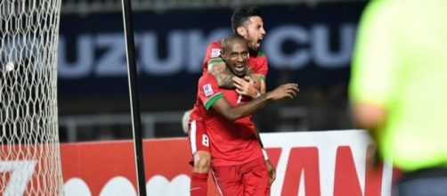 Indonesia's Boaz Solossa and Stefano Lilipaly celebrate the winning goal