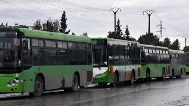 Bus utilizzati per l'evacuazione città di Aleppo (via Dawn)