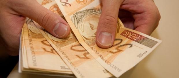 Novo salário mínimo entra em vigor no dia 1 de janeiro de 2017 (Foto: Reprodução) Novo salário mínimo entra em vigor no dia 1 de janeiro de 2017 (Foto: Reprodução)
