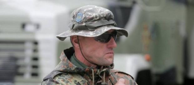 Ukraiński żołnierz z emblematami SS Ukraiński żołnierz z emblematami SS