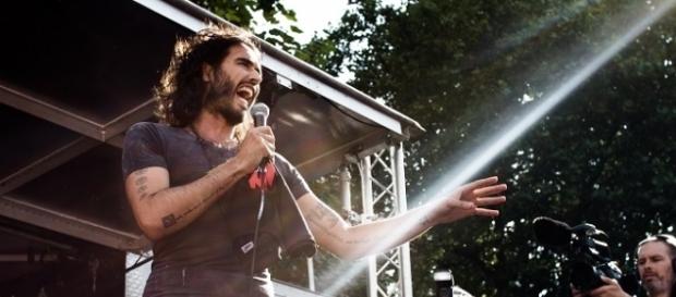 Source: Wikimedia DB Young: Russell Brand speaking at rally Source: Wikimedia DB Young: Russell Brand speaking at rally
