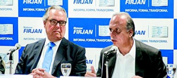 Presidente do Firjan ao lado de Pezão. Presidente do Firjan ao lado de Pezão.