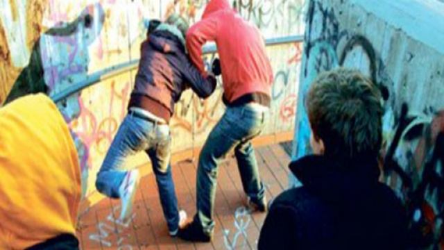 Immagine raffigurante un attacco di bullismo.