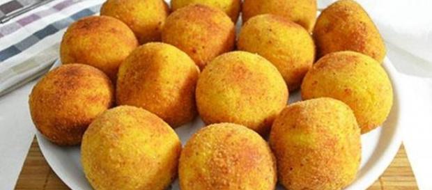 Arancini con ricotta, spinaci e uova di quaglia Arancini con ricotta, spinaci e uova di quaglia