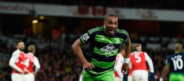 Ashley Williams celebrates his 74th minute winner Ashley Williams celebrates his 74th minute winner