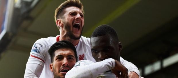 Benteke and team mates celebrate his late winner Benteke and team mates celebrate his late winner