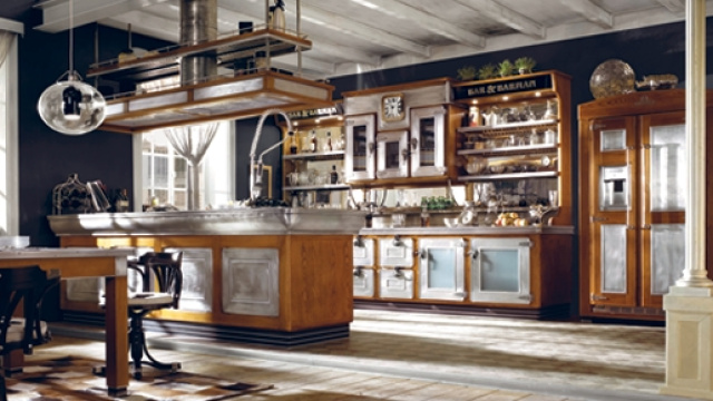 L’uso di peltro e legno è la peculiarità della cucina Bar & Barman di Marchi Cucine