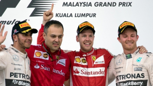 Premiazione GP Malesia con Hamilton e Vettel