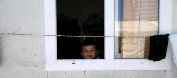 Copii de 9 ani sunt învăţaţi să ucidă "infideli" Copii de 9 ani sunt învăţaţi să ucidă "infideli"