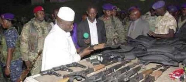 Jammeh with some of the weapons seized from the assault on his presidential compound / Photo via GRTS Jammeh with some of the weapons seized from the assault on his presidential compound / Photo via GRTS