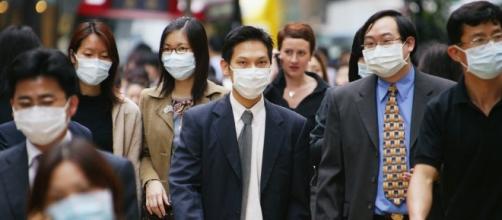 No Japão utilizar máscaras para proteção contra doenças é comum (Foto: Reprodução/CNN)