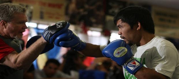 Manny Pacquiao boxing workout at the Wild Card gym (2014) -- Oliver Petalver / TheDailySportsHerald. Manny Pacquiao boxing workout at the Wild Card gym (2014) -- Oliver Petalver / TheDailySportsHerald.