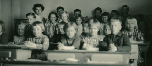 Children in school setting circa 1900 courtesy Flickr
