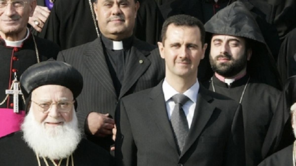 Risultati immagini per bashar al assad chiesa siriana