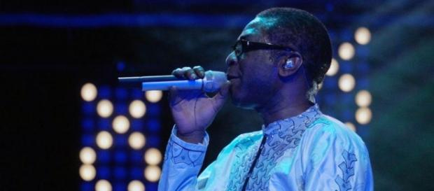 Youssou Ndour singing at a music festival in Europe / Photo via Youssou Ndour Official Youssou Ndour singing at a music festival in Europe / Photo via Youssou Ndour Official