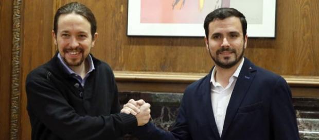 Pablo Iglesias y Alberto Garzón tras el acuerdo entre Podemos e Izquierda Unida Pablo Iglesias y Alberto Garzón tras el acuerdo entre Podemos e Izquierda Unida