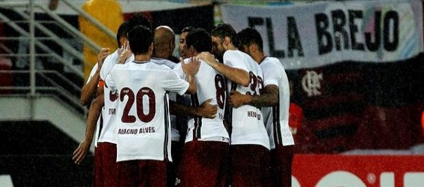 Jogadores do Flu comemoram um dos gols da vitória sobre o Flamengo no último domingo (Foto: Nelson Perez / Fluminense FC) Jogadores do Flu comemoram um dos gols da vitória sobre o Flamengo no último domingo (Foto: Nelson Perez / Fluminense FC)