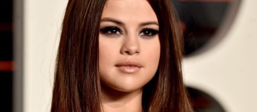 Watch Selena Gomez Get Stuck In An Elevator And Totally Keep Her ... - mtv.com