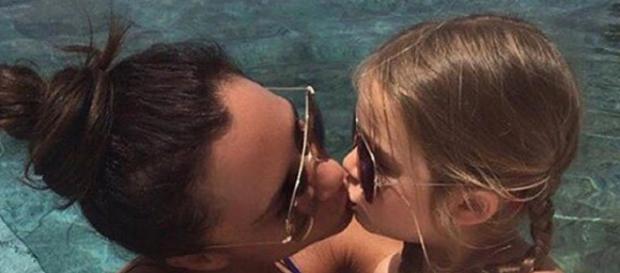Victoria Beckham kisses daughter Harper on the lips Victoria Beckham kisses daughter Harper on the lips